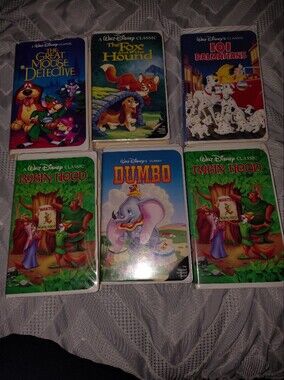 Disney Classic VHS Set with Green Robin Hood, Blue Dumbo & Multicolor Covers
